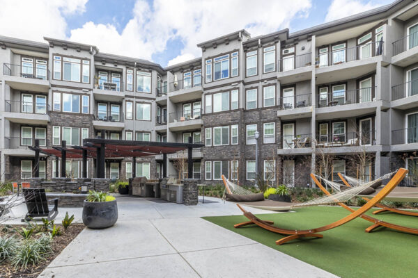 Element 79 courtyard with built in BBQ grills and hammocks.